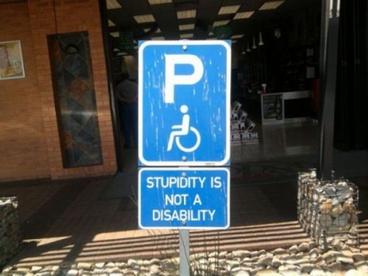 http://www.funnyphotos.net.au/images/disabled-sign-stupidity-is-not-a-disability1.jpg